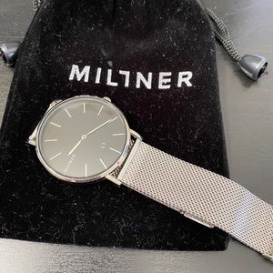 Brand new Miliner silver around face watch .